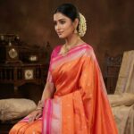Orange Soft Silk Saree with Pink Zari Border