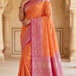 Sunset Orange Soft Silk Saree with Pink Zari Border