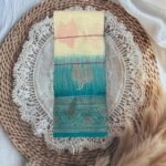 Cream & Teal Silk Cotton Saree with Leaf Motif Border